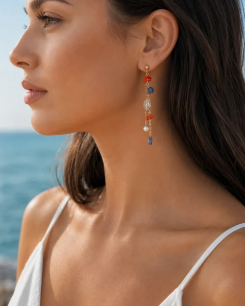 Orecchini con orallo del Mediteraneo e perla di fiume